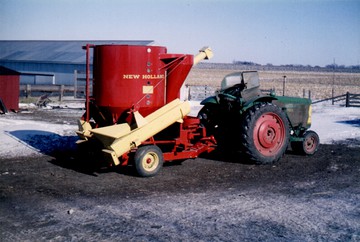 1951 Oliver 77 Row Crop W/ NH Grain Mixer - The 77 in the old farmyard hooked to what  looks to be a brand new New Holland grain  mixer. Photo taken Dec. 1965.