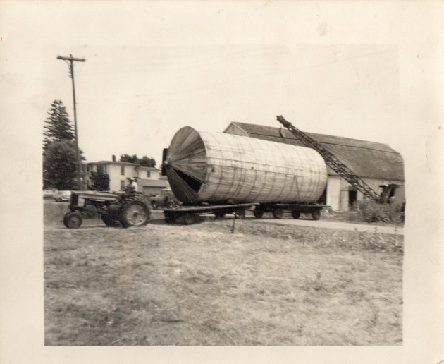 Moving A Silo - These are 6 pictures from 1962 when my Uncle Jerry Orbaker had a wooden stave silo moved from his farm across the road to my Grandpa's farm.That's my Uncle's John Deere 520 tractor