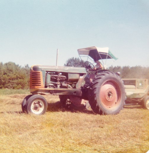 1950 Oliver 88 And 62T Baler - My Mom baling on my Aunts farm. Got this tractor  used about 1966. Traded it in on the 1555 we  still have in 1977.