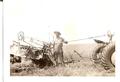 Tractor Controlled From Grain Binder - My uncle put this together. The tractor was controlled from the grain binder seat. The tractor is a Farmall F20 and I believe the binder is a John Deere. Picture was probably taken in the 1940