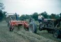 1936 Farmall F20 With Mcdeering 45 Baler - This was taken at the Wooley farm north of West Harrison, IN in June 1953.  Driving the tractor is Glenn Williams and on the wagon in overalls is Harlan L. Williams.  The other man on the wagon is Francis 