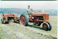 1948? Farmall H & MD Model 45? Baler - Last of three photos. This my grandfather, H. E. Park at the wheel, baling for the cattle. I miss him and the farm. I own an H plus an 8N to be similar to his rolling stock  