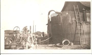1937 John Deere B 38838 - We had a dairy making silage probably before I was born. (1941) my dad is on the truck