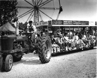 New Farmall H Pulling Fair Wagon - Indiana State Fair Must be 1952 or 53 I'm the little guy sitting between my sister and my grandmother[sixth from front on wagon].