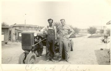 1943 Allis Chalmers C - My Grandfather right and his Nephew who was in the war. I noticed there was no 'C' emblem on this model yet.