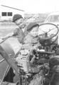 We Called It The Little Ford - My mother took this picture of my older brothers in 1952. Getting to ride on the tractor was a big deal.All five children in our family learned to drive on the 