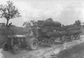 1927 Fordson Log Train - lunchboxes on first trailer Get ready to jump Virgil, we got no brakes!