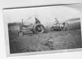 1936 A John Deere - This picture was taken in the spring of either 1938 or 1939 on a lake bed of a lake in West Central Minnesota.  There is currently about 14ft of water where the tractor is sitting in the picture.  Our family still has the tractor with the spoke wheels and the original steel wheels.  Tractor still runs great