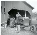 Allis Chalmers 1957 D 14  - This is my Father on his 1957 D 14 that he bought new. I still have this same tractor today. Has been in the family since it was new. 