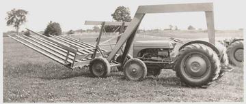 Ferguson With Stack Mover - old hay stack mover.