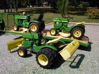 3- John Deere 110'S, W Trailer