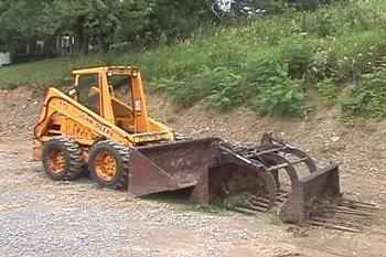 John Deere 675 Skid Steer