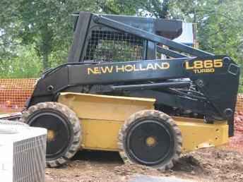99 New Holland LX865 Skid