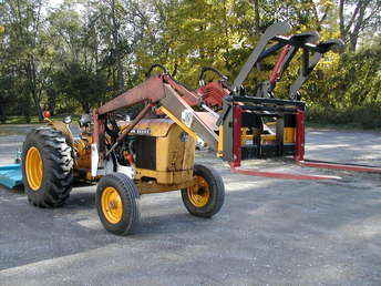 John Deere 301A W/ Loader