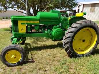 1957 John Deere 520 LP - An excellant vintage tractor. Only 764 made, 25HP,  power steering,  tires good, complete JD 3 point. Or best offer, I need the space in ~nl~the barn. Its a GREAT tractor runs good.  If you need a light working ~nl~tractor or a parade tractor this is it!!!!  Call soon, it wont last ~nl~long at this price.