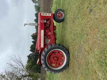 1957 Farmall 450 Diesel - Tractor starts and runs good. Has very good tires. Would be nice for  tractor shows or tractor rides.