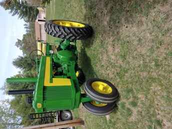 John Deere 620 - Repainted, have decals,like new tires,,  good clutch and brakes. Runs and starts ~nl~good. 3 point.