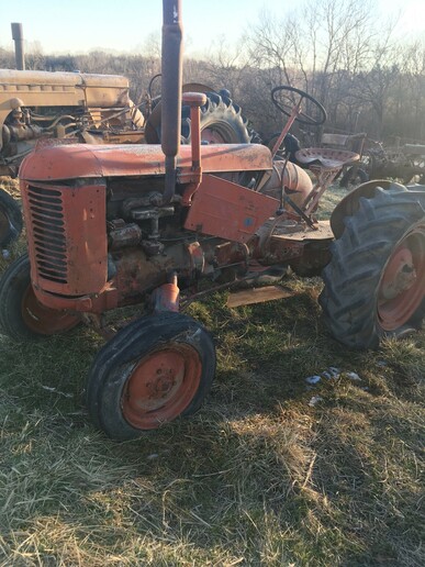 Case VAI - Case VAI Looks like it is pretty complete but I don't know much about it.  Sheet metal was set on it for photo.  Rear rims have been worked on.  Neat little tractor. Was barn kept for years.  I have not tried to run it.  600 obo