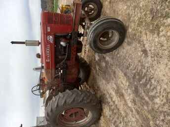 2 Farmall SMTA Tractors -  each. one with wide front, power  steering. other with narrow front. both ~nl~good runners. wf tractor needs needle and ~nl~seat for carb. keeping weights and fenders ~nl~off them, but would sell too.