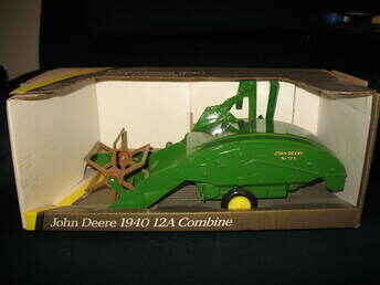 John Deere 1940 12A Combine - This John Deere 1940 12A Combine was made by Ertl in 1991. In 1/16 scale, the combine is made of diecast with rubber tires. I have owned this since 1998 and I have never removed it from the packaging. I can send more pics if requested. Will consider offers.