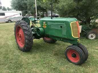 Oliver 70 - Nice Oliver 7o tractor, believed to be early 40's. Starts good, runs  good. Tires are fair. Has higher speed gears or rearend, runs down ~nl~the road much faster then a 77. Makes a good tractor ride tractor as ~nl~you can keep up with the pack